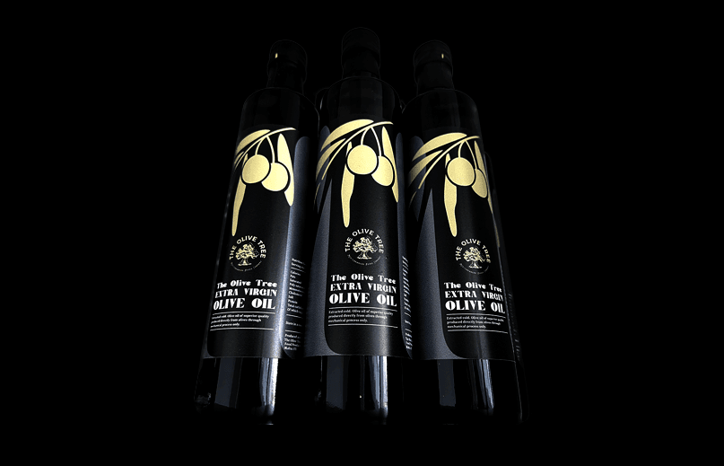 Three bottles of The Olive Tree Extra Virgin Olive Oil